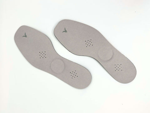 Therapeutic insoles for foot pain relief showing proprioceptive stimulation points