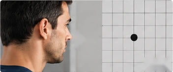 Man in profile looking at a dot on a grid